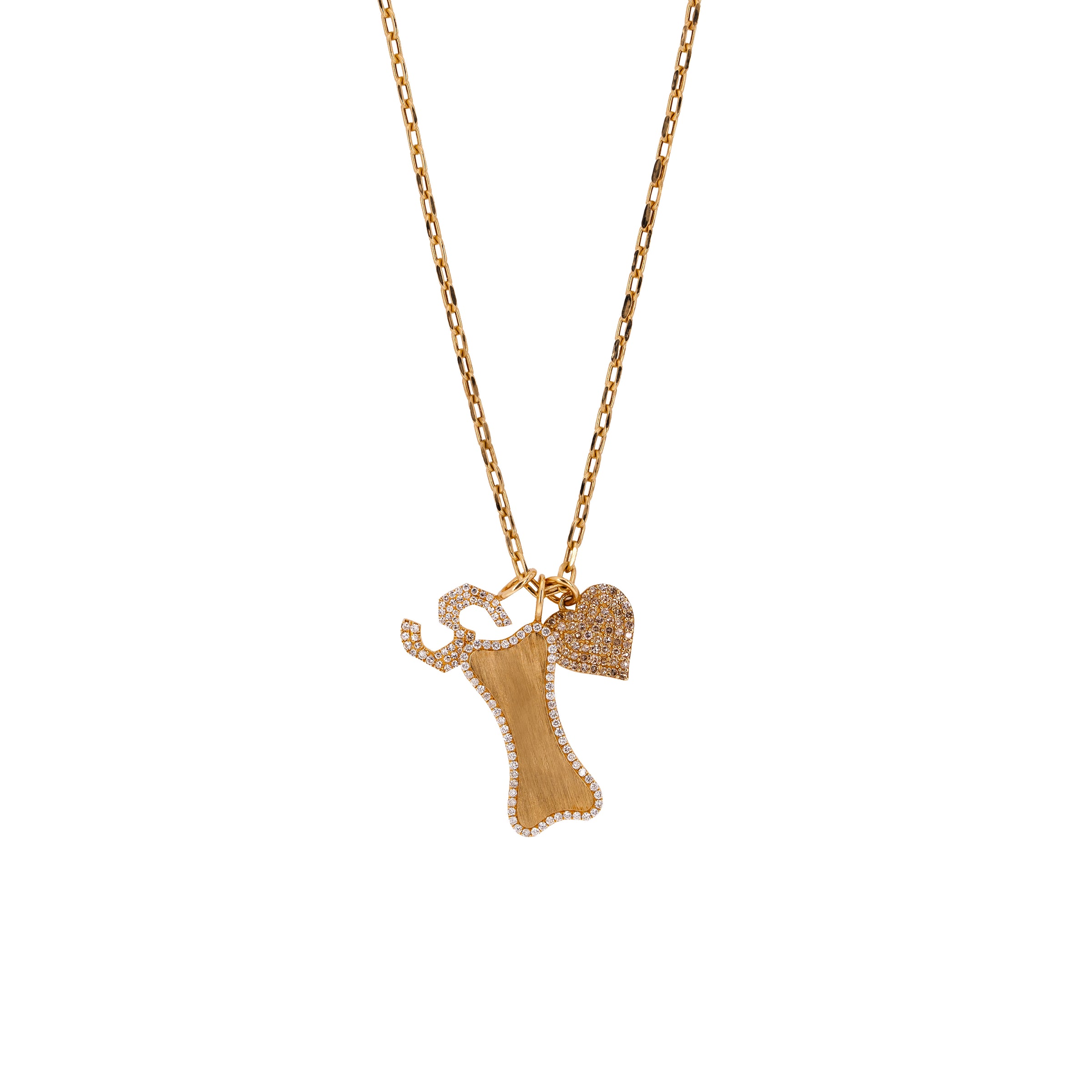 A 14K yellow gold charm necklace with a white diamond alphabet pendant, Small Diamond Dog Bone Pendant, and a diamond heart pendant.