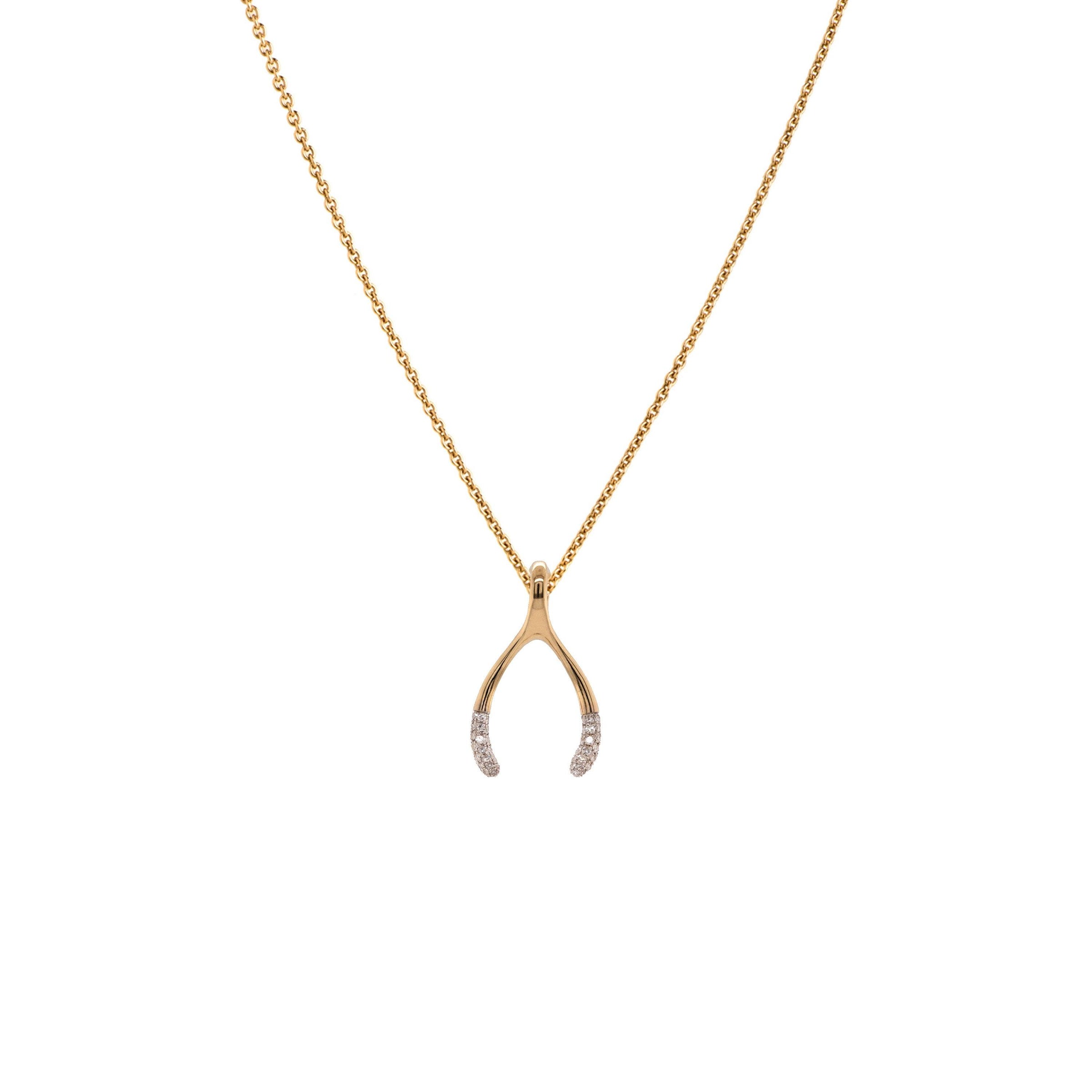 Small Wishbone Necklace: 14K Gold small wishbone necklace on a white background