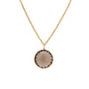 Smoky Quartz Crystal Galaxy Necklace: A round smoky quartz crystal pendant featuring a small diamond star on the bottom right corner. with a gold yellow gold chain 