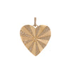 Spiral Heart Pendant: A 14K gold diamond pendant in the shape of a heart with a spiral pattern in the center.