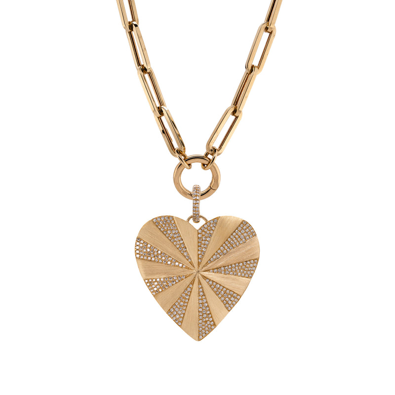 Spiral Heart Pendant and Large Paperclip with clasp: A 14K gold diamond pendant in the shape of a heart with a spiral pattern in the center, attached to a gold chain with a clasp.