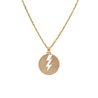 Storm Medallion Necklace: A 14K gold medallion with a lightning bolt outlined on a yellow gold chain