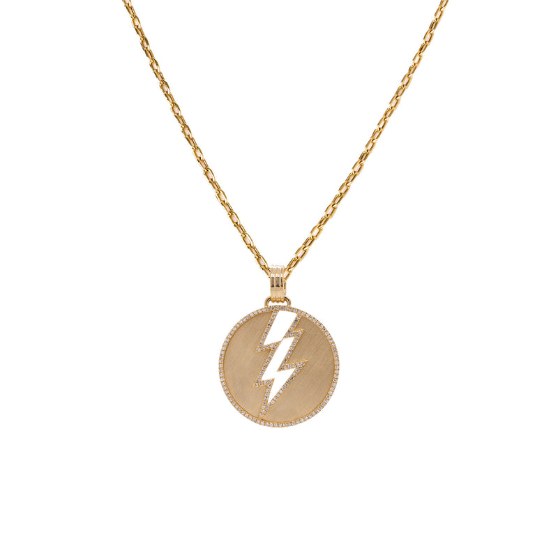 Storm Medallion Necklace: A 14K gold medallion with a lightning bolt outlined on a yellow gold chain