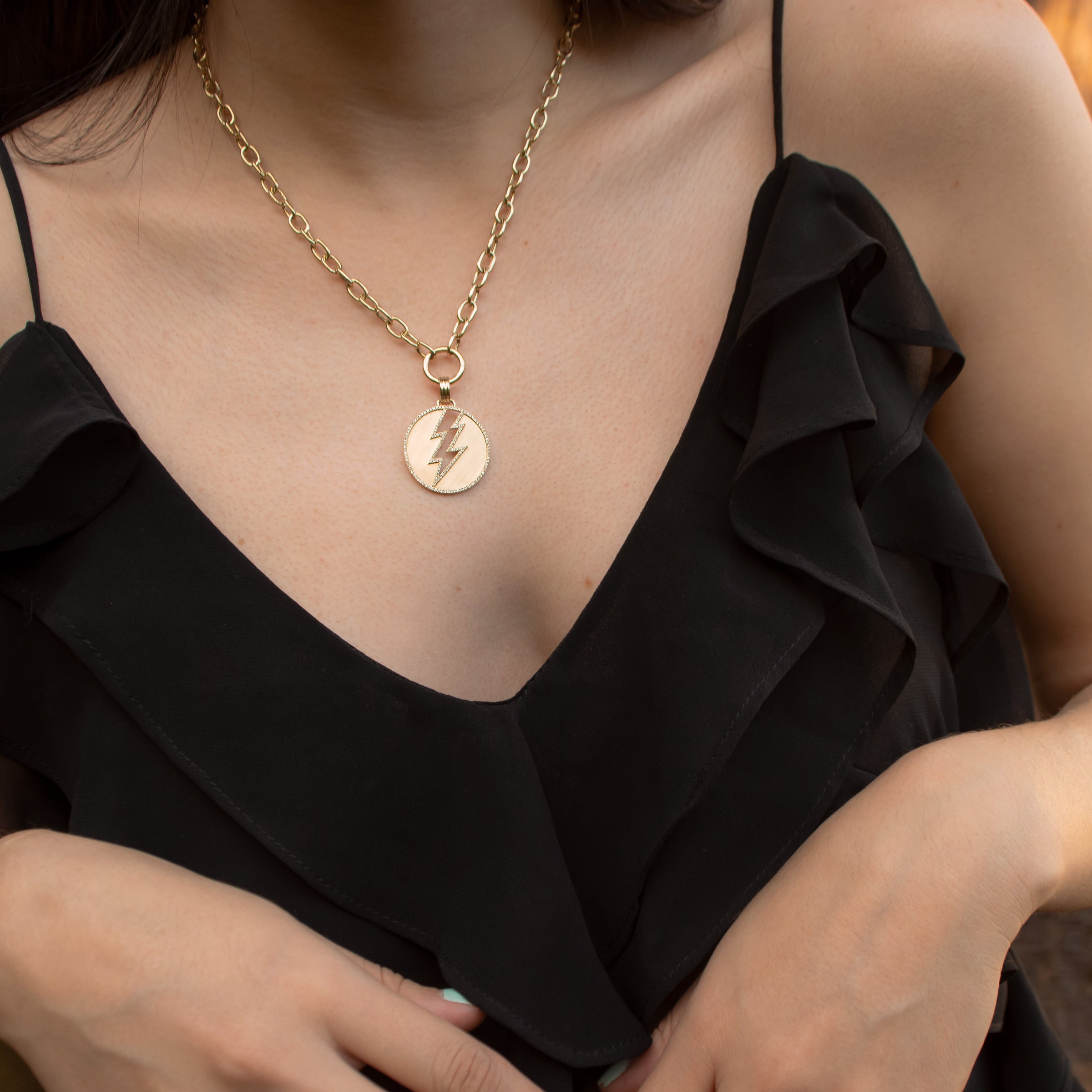 Woman wearing the Storm Medallion Necklace