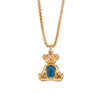 14K Gold box chain necklace with a bear-shaped pendant, Teddy Pendant, featuring a London Blue Topaz gemstone on a white background