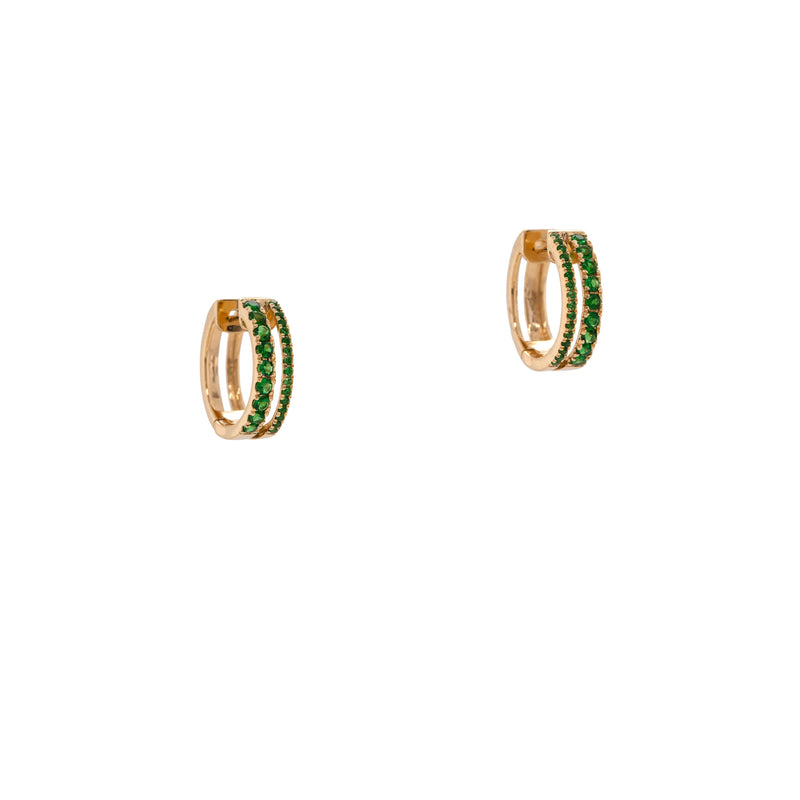 Tsavorite Chloe Huggies: 14K gold huggie earrings with green gemstones on a white background