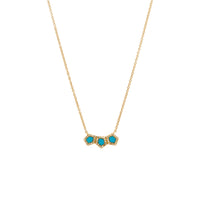 Turquoise Prism Bar Necklace: 14K gold necklace with turquoise hexagon-shaped stones outlined by diamonds on a gold chain against a white background