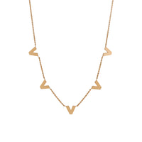 Venus Necklace: The Shiny side of the 14K yellow gold chain necklace with a lobster clasp fastening, featuring geometric shaped pendant links.