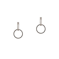 White Gold Open Bar Diamond Huggies w/ Reversible White & Black Diamond Round Extensions: A pair of 14K gold huggie earrings with extensions of one side featuring black diamonds and the other side featuring white diamonds