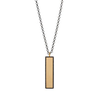 Yellow Gold Black Diamond Dog Tag Necklace: crafted in 14K gold with a chain, featuring a rectangular pendant with a black diamond-encrusted edge.