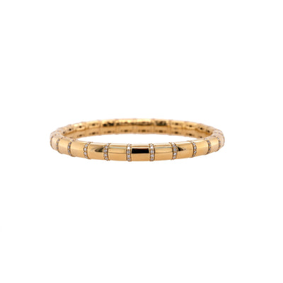 Diamond section stretch bracelet, 14K gold bracelet with small diamonds on a white background