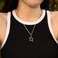 woman wearing the Hollow Diamond Star Necklace