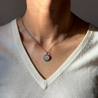 woman wearing the Silver Mini Link 16in-18in Adjustable Chain with Silver Black Diamond Round Pendant