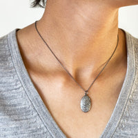 woman wearing the Silver Oblong Pave Diamond Necklace