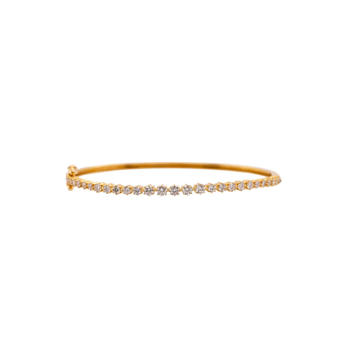 24/7 Diamond Bangle: A 14K yellow gold bangle bracelet featuring a series of diamonds set around its circumference.