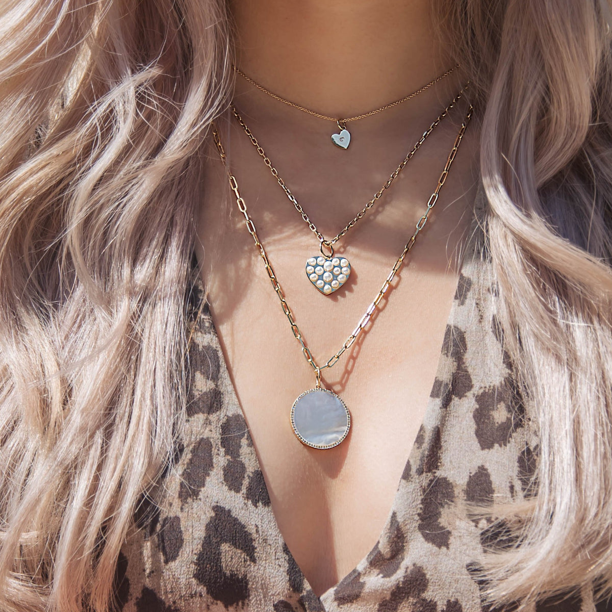 LARGE MOTHER-OF-PEARL MEDALLION