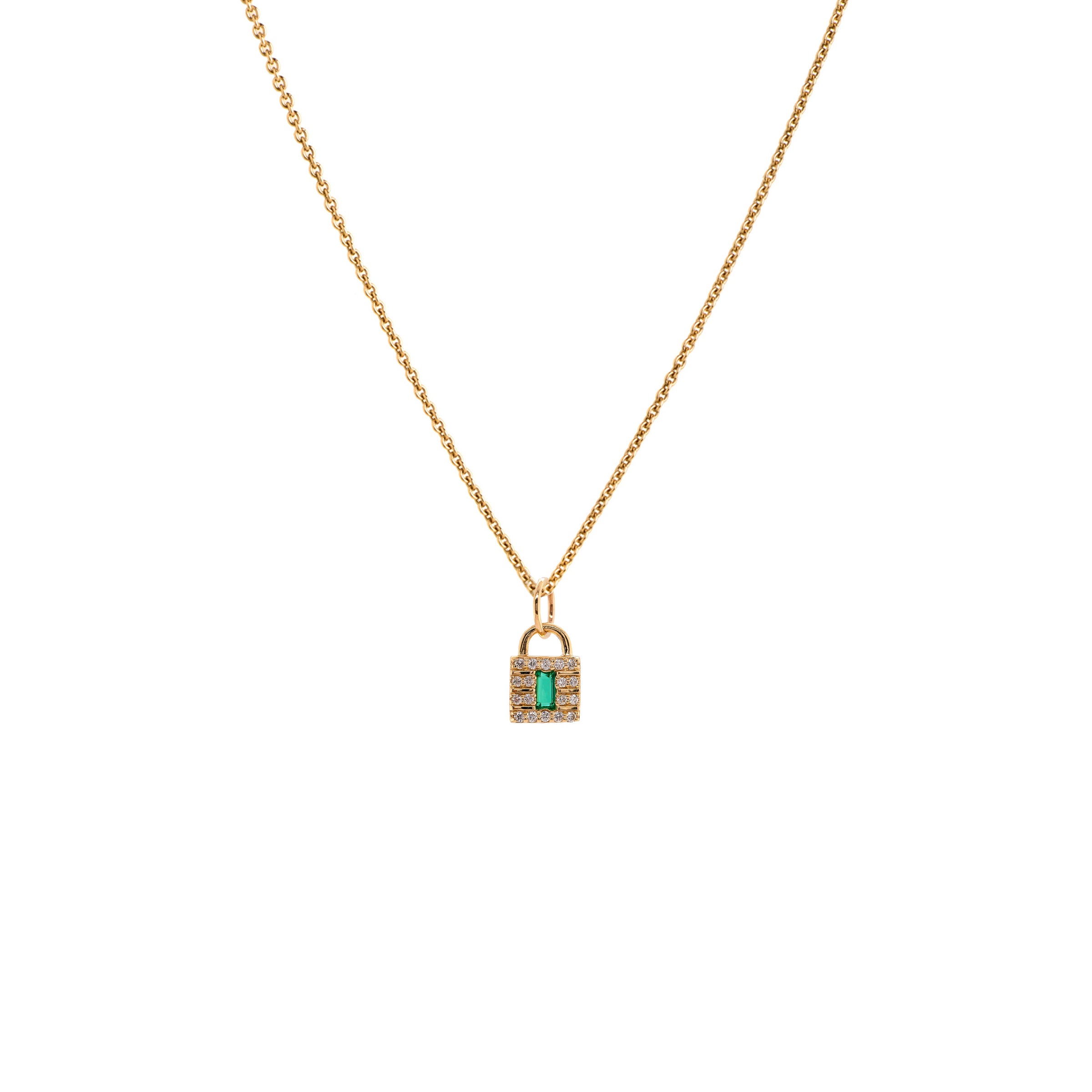 Baby Emerald Lock Necklace: A 14K gold necklace featuring an emerald and diamond pendant in a lock and key setting.