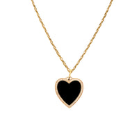 Black Enamel Heart Necklace: A 14K yellow gold enamel heart-shaped pendant surrounded by diamonds, attached to a matching yellow gold chain.