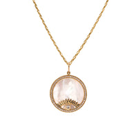Cream Mother-of-Pearl Evil Eye Medallion Necklace: 14K Gold Medallion with a Mother-of-Pearl Center and Evil Eye Design surrounded by diamonds on a chain