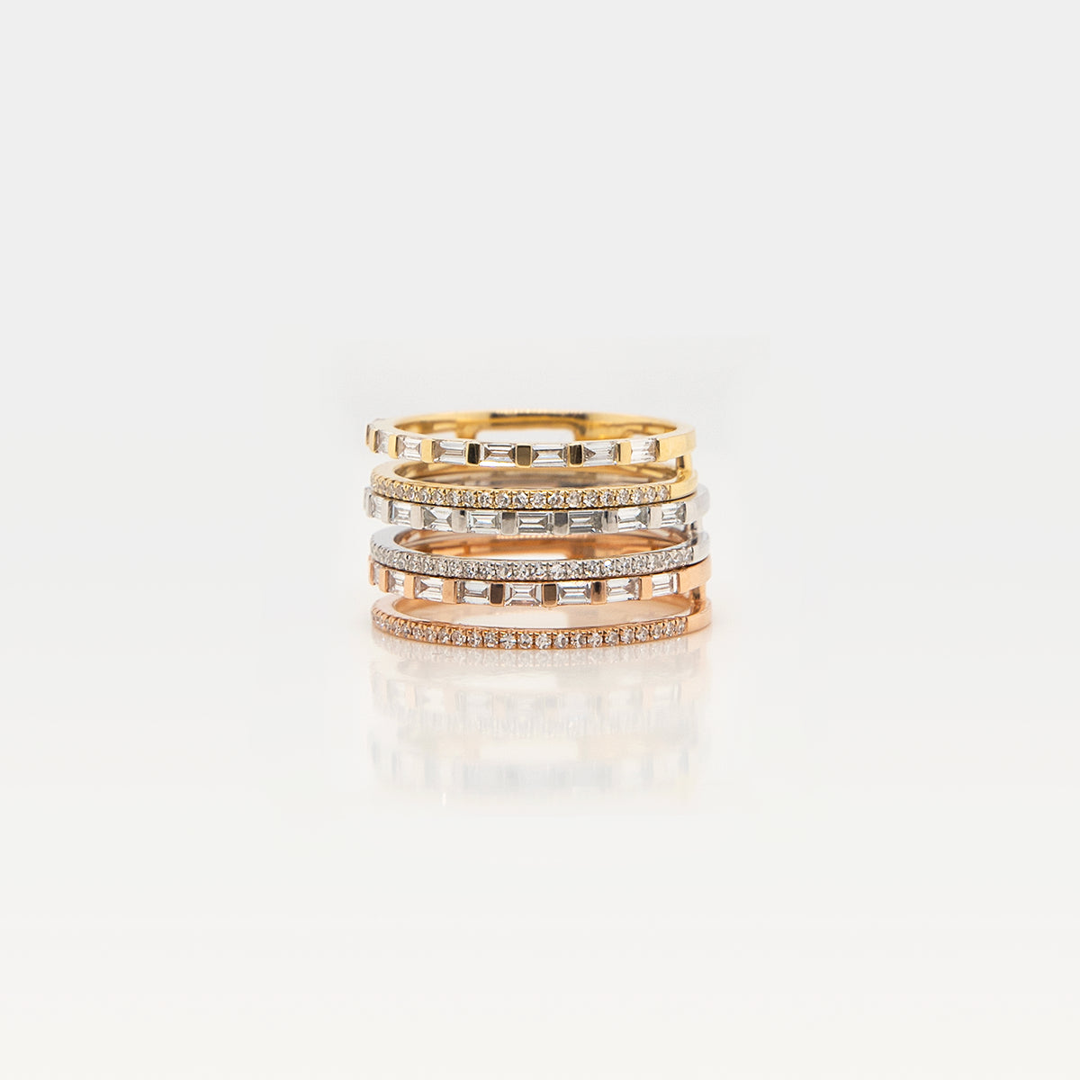 Deco Ring: 14K Gold rings with a row of round diamonds and a row of baguette diamonds