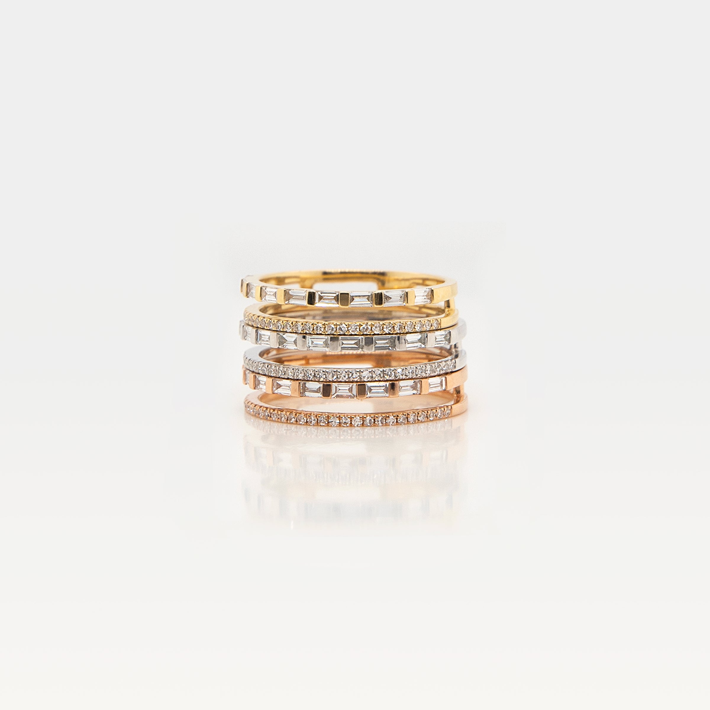 Deco Ring: 14K Gold rings with a row of round diamonds and a row of baguette diamonds