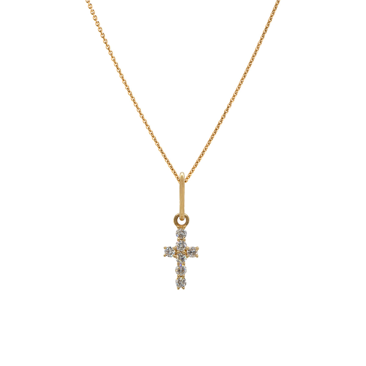 Diamond Cross Necklace: A 14K gold diamond cross pendant with a length of 1/2 inch and a width of 1/4 inch on a chain.