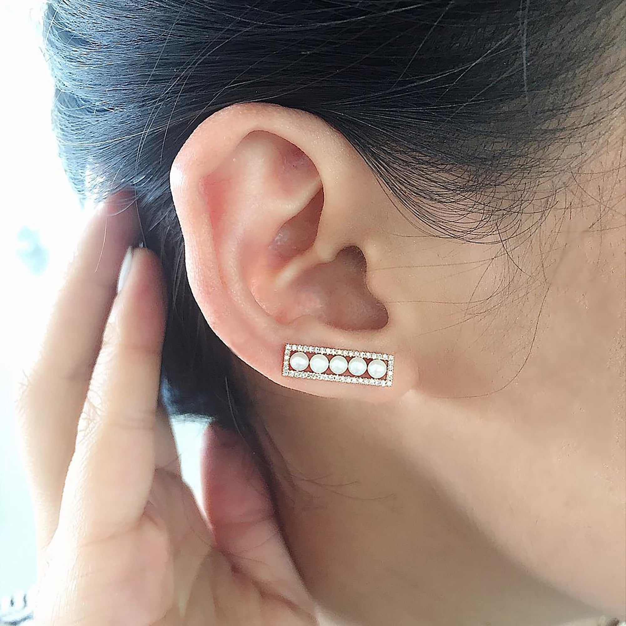 Diamond and Pearl Ear Crawler on a ear