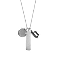 a silver charm necklace with the Dog Tag Pendant, the Small 'b' Black Diamond Alphabet Pendant, and the Octagon Black Diamond Pendant