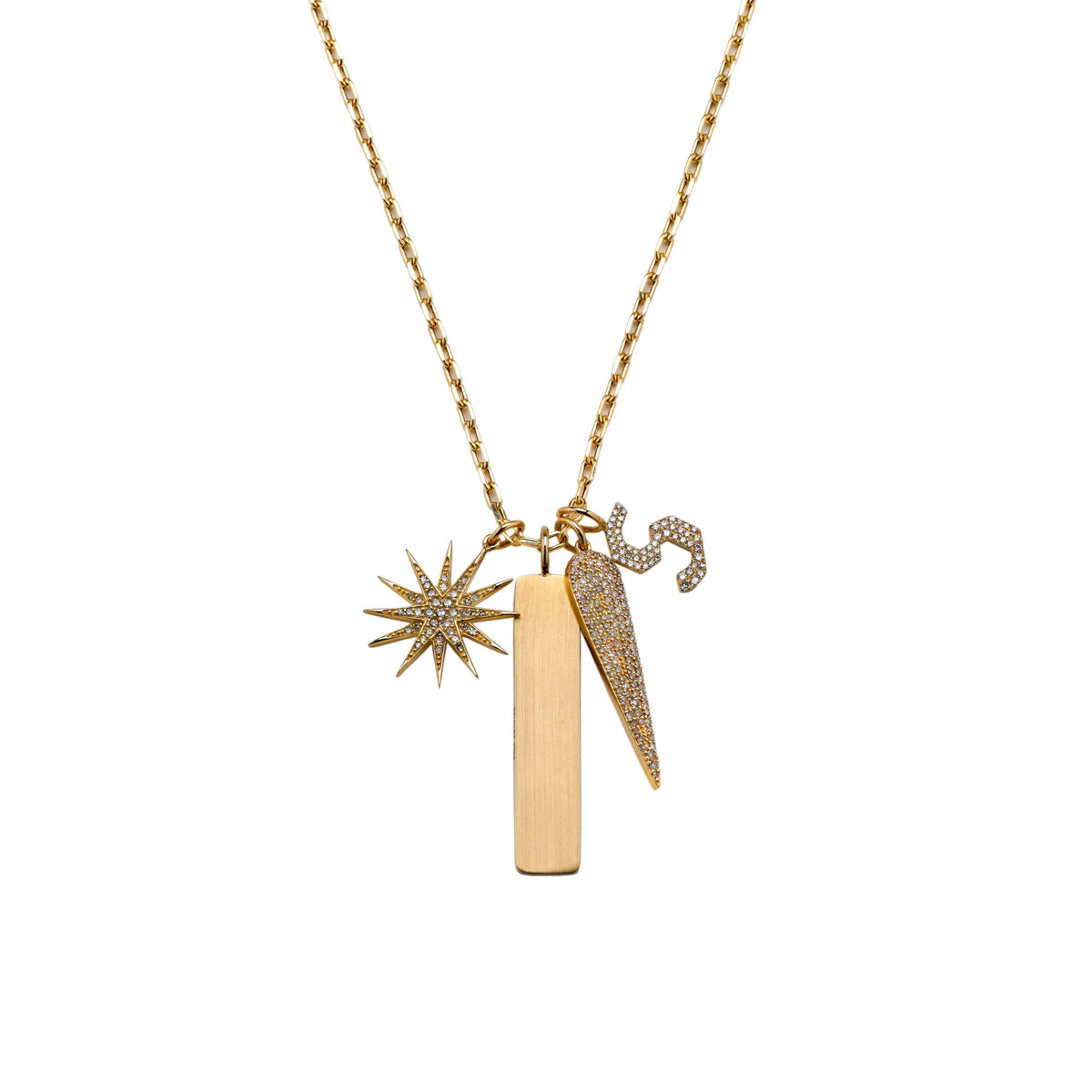 A charm necklace with the Dog Tag Pendant, the Starburst Diamond Pendant, the Small White Diamond Alphabet Pendant, and the Long Reverse Teardrop Diamond Pendant