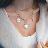 MOTHER-OF-PEARL HALO HEART PENDANT