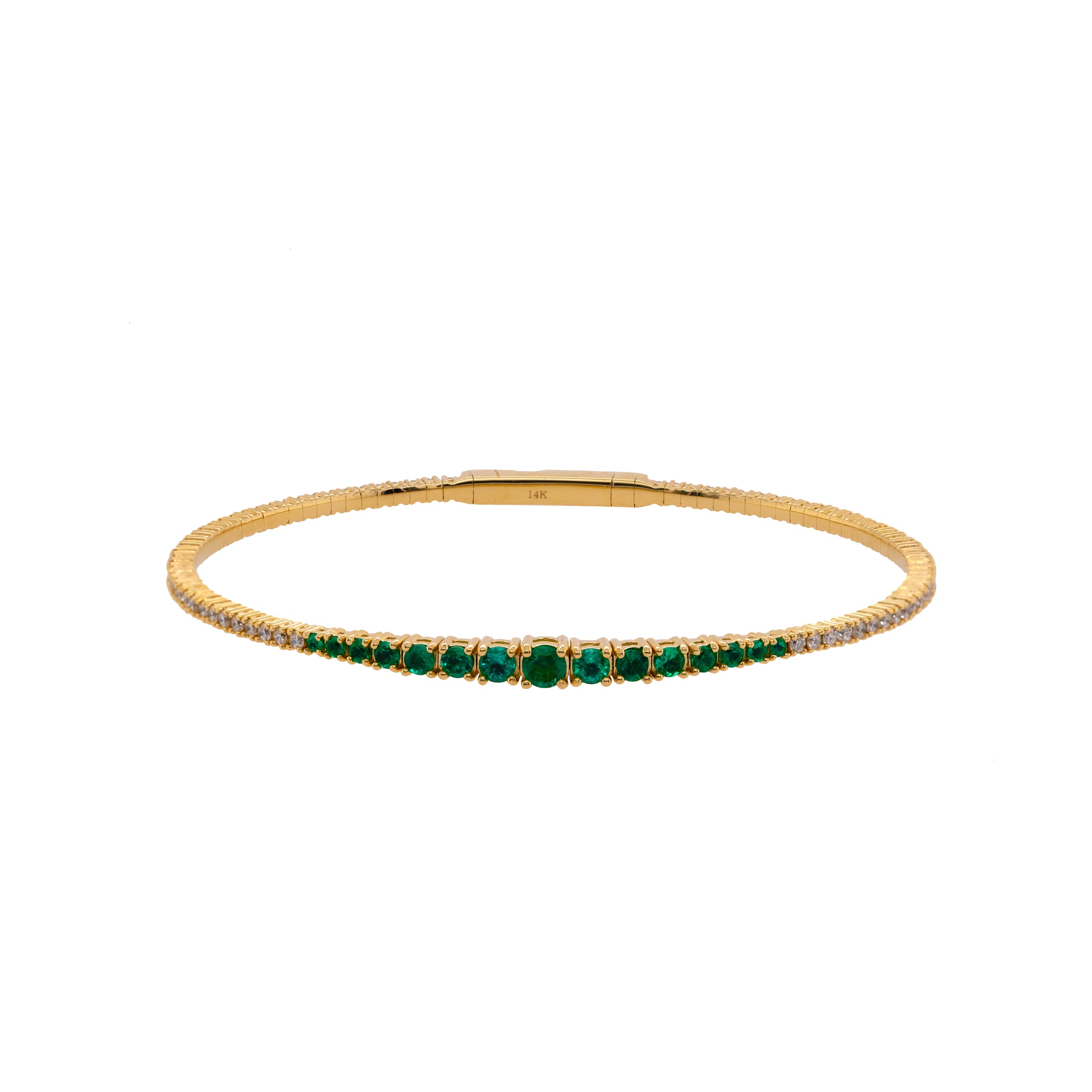 Emerald & Diamond Flexible Bangle: A 14K yellow gold bangle bracelet featuring emeralds and diamonds.