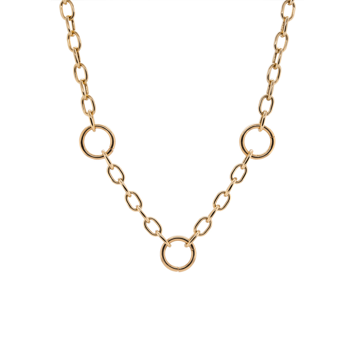 Kylie Chain Necklace: A 14K yellow gold chain necklace with a lobster clasp fastening and three round charm clasps.