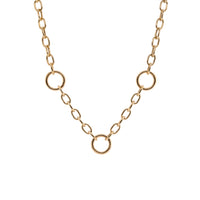 Kylie Chain Necklace: A 14K yellow gold chain necklace with a lobster clasp fastening and three round charm clasps.