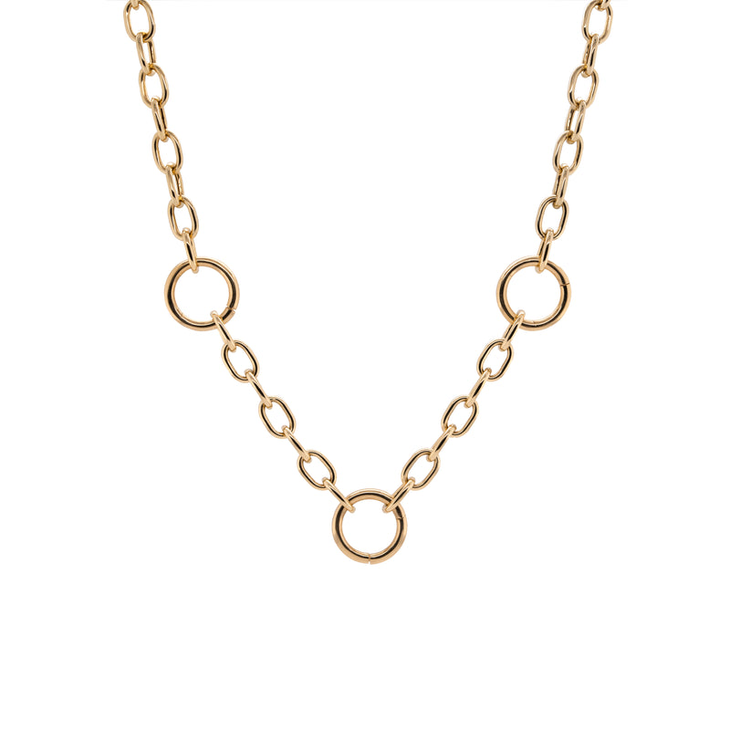 Kylie Chain Necklace: A 14K yellow gold chain necklace with a lobster clasp fastening and three round charm clasps.