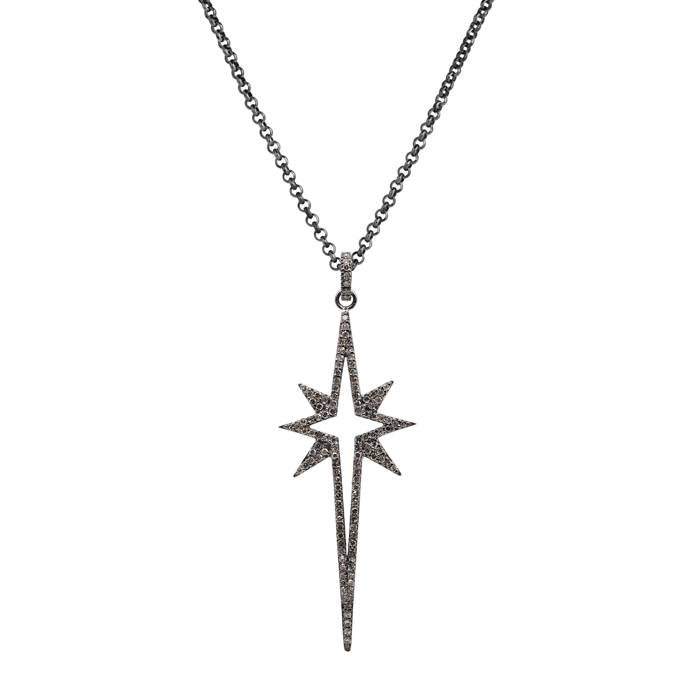 Large Starburst Spear Necklace: a silver spear pendant in the shape of a large starburst on a chain