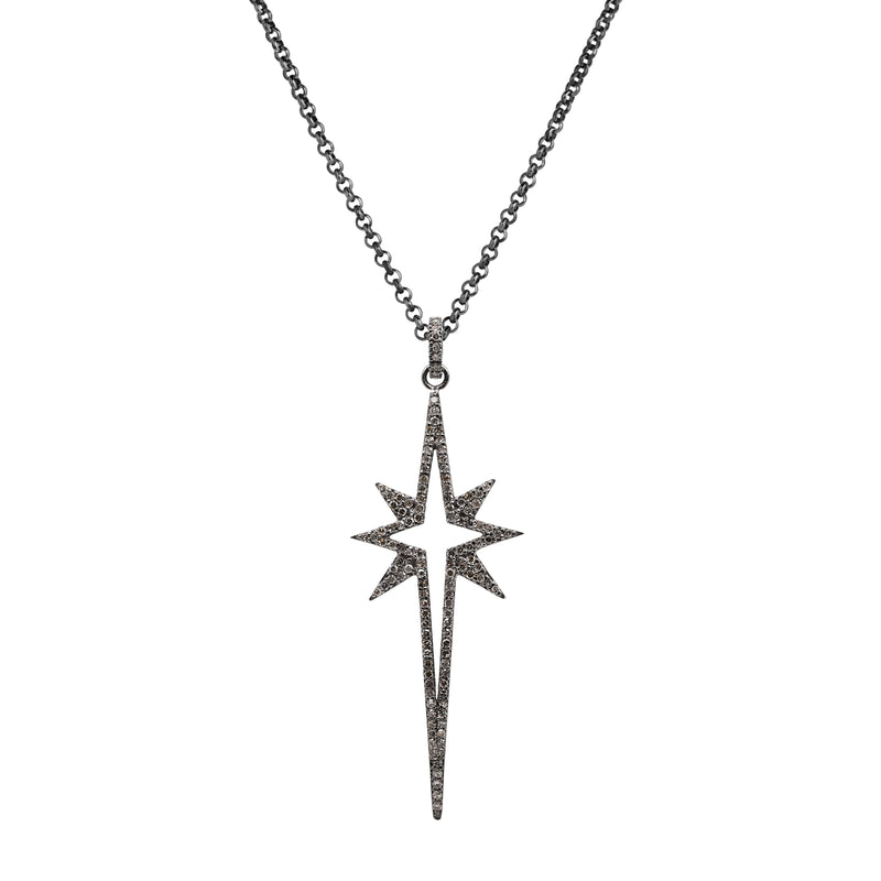 Large Starburst Spear Necklace: a silver spear pendant in the shape of a large starburst on a chain