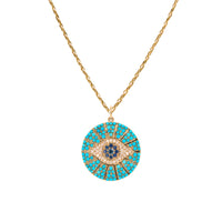 Large Turquoise Evil Eye Medallion Necklace: A medallion necklace with a yellow gold chain and a turquoise medallion featuring an evil eye design with diamonds and blue sapphires.