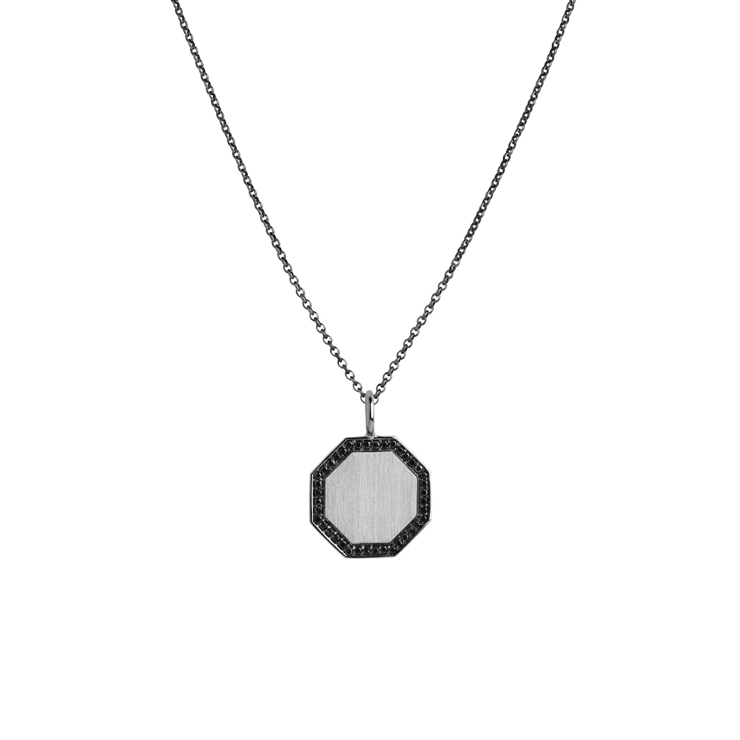 Octagon Black Diamond Necklace: A sterling silver black diamond pendant with an octagonal frame on a chain.