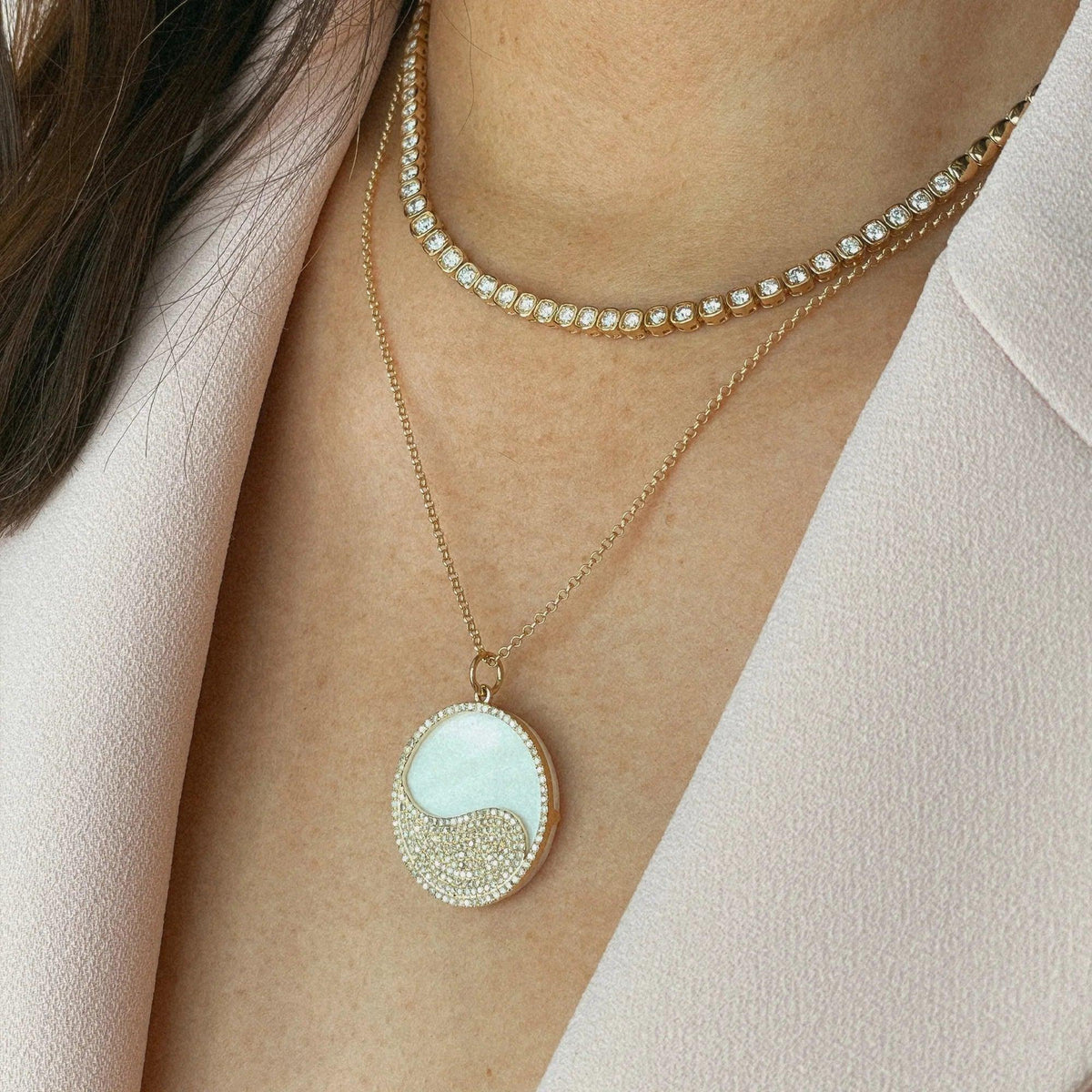 close up of the woman wearing the Mother-of-pearl Balance Medallion Necklace