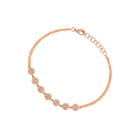 Rose Gold 7-Dot Diamond Bracelet: A 14K gold bracelet with diamond dots, featuring a lobster clasp fastening.