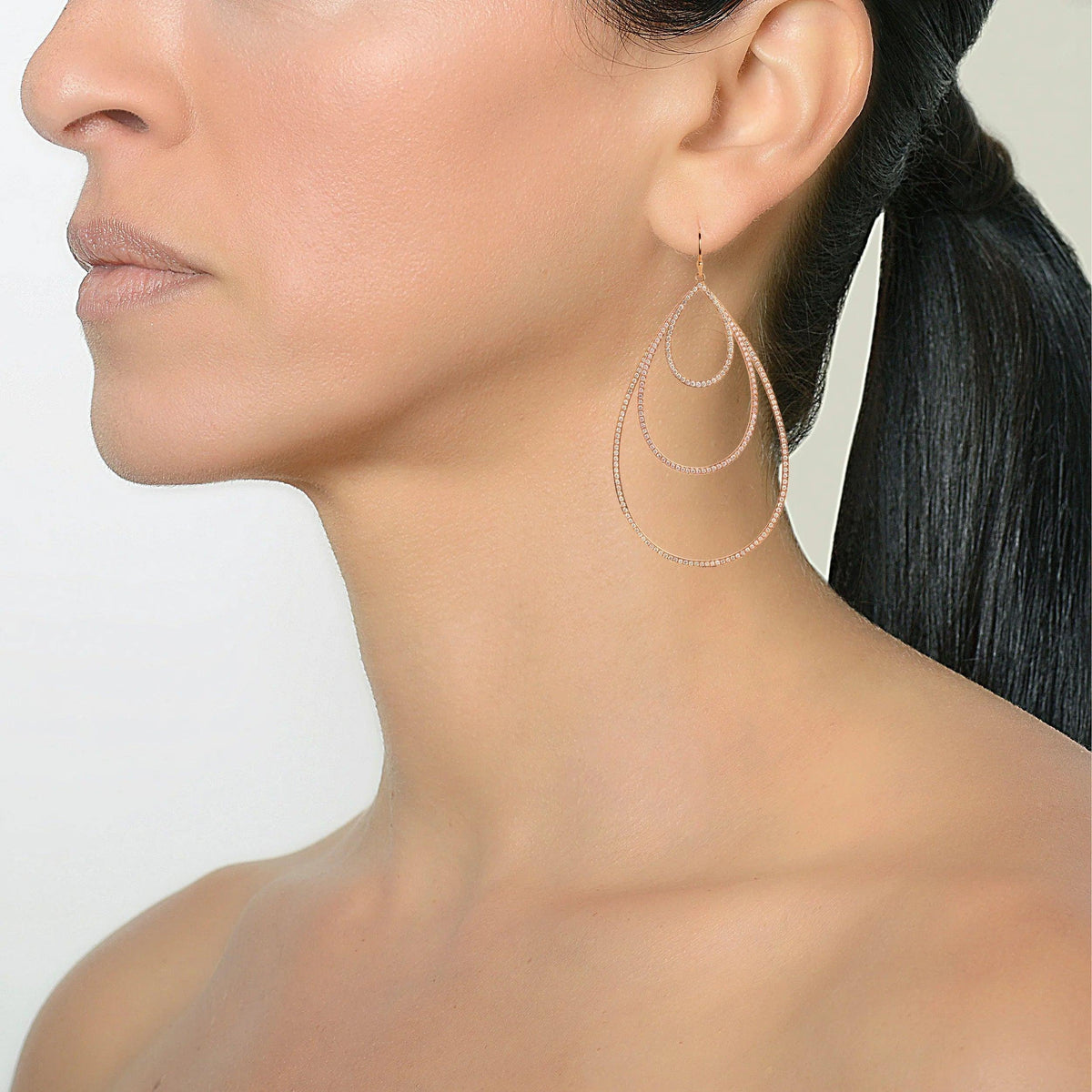 Rose Gold Small, Medium, & Large Diamond Teardrops on the model