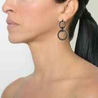 Silver Center Knot Mesh Earrings on a model