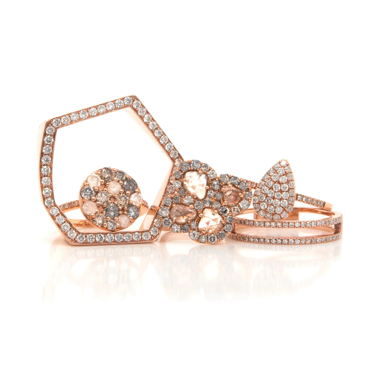 The Hexagon Diamond Ring. the Diamond Clover Ring, the Diamond Teardrop Ring, the Open Bar Diamond Ring, and the Diamond Dotted Circle Ring