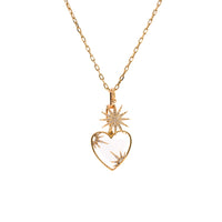 A 14K yellow gold charm necklace with the Timeless Double Link Clasp, the Loving Life Pendant, and the Starburst Diamond Pendant