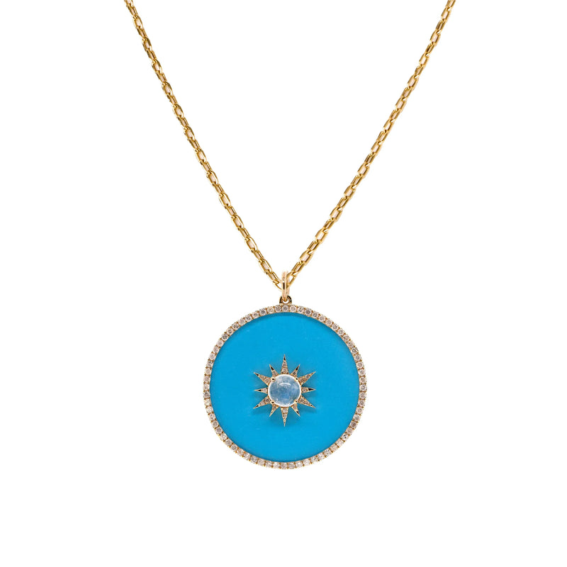 Turquoise Halo Medallion Necklace: A 14K yellow gold necklace with a turquoise medallion and a sun motif in the center.