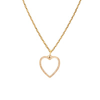 White Enamel Heart Necklace: A 14K yellow gold enamel heart-shaped pendant surrounded by diamonds, attached to a matching yellow gold chain.