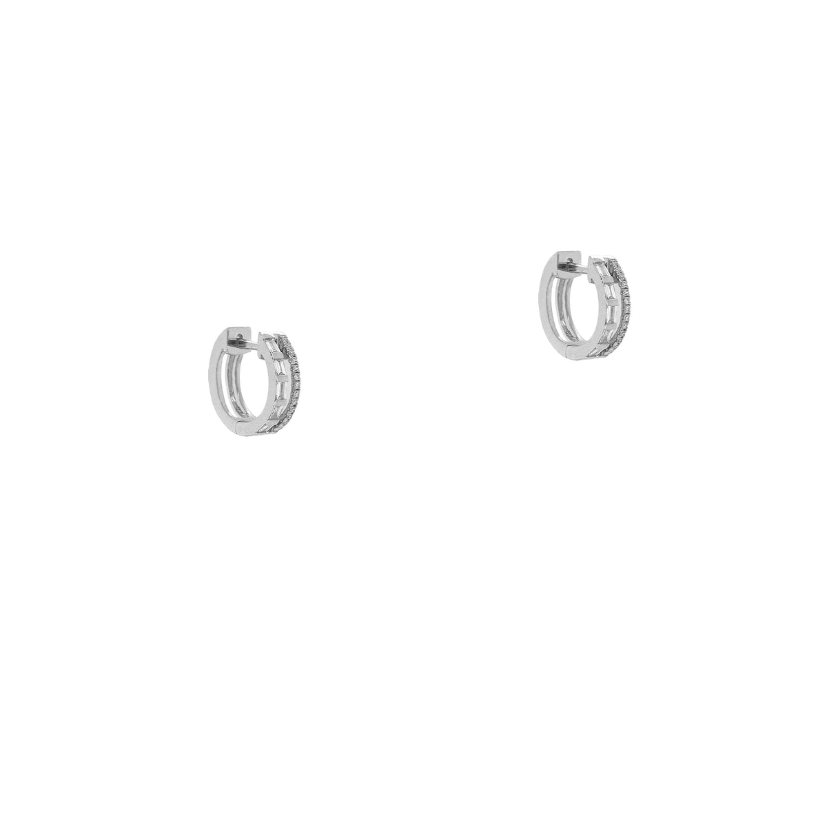 Deco Huggies: A pair of white gold huggie earrings with baguette and round diamonds set in them.