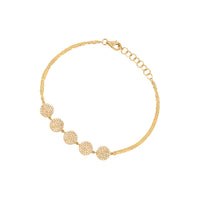 Yellow Gold 5 Dot Diamond Bracelet: A 14K gold diamond-accented bracelet with a lobster clasp fastening.