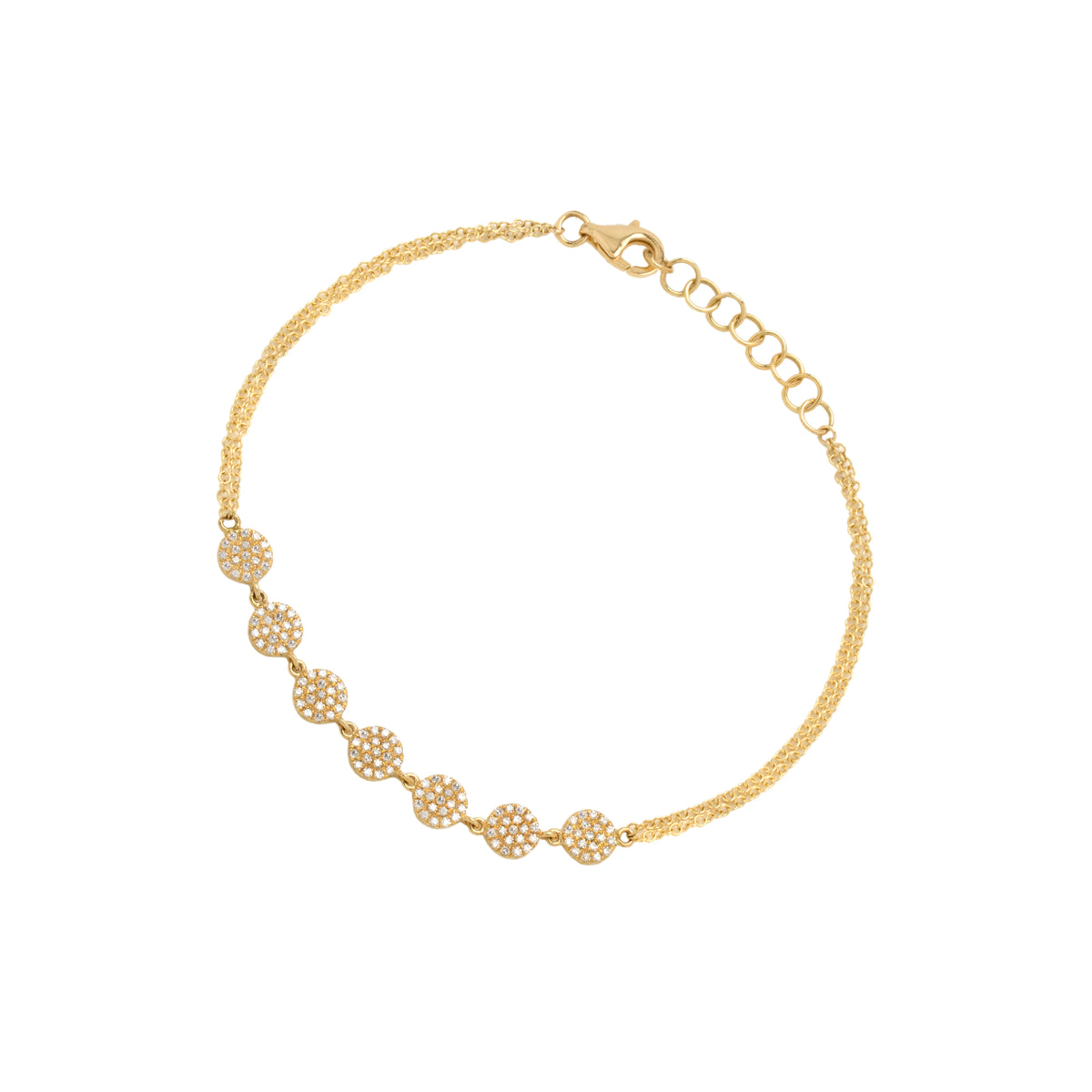 Yellow Gold 7-Dot Diamond Bracelet: A 14K gold bracelet with diamond dots, featuring a lobster clasp fastening.