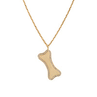 Yellow Gold Large Diamond Dog Bone Necklace: A large 14K gold engravable dog bone pendant surrounded by diamonds on a chain.